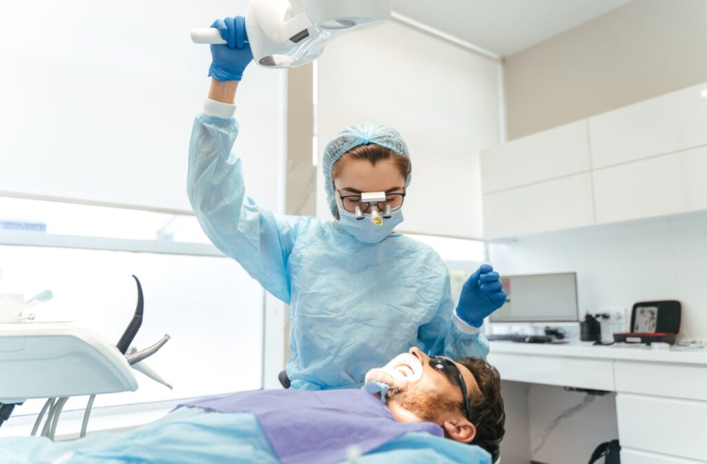 A dentist and patient who has had sedation dentistry during a dental appointment